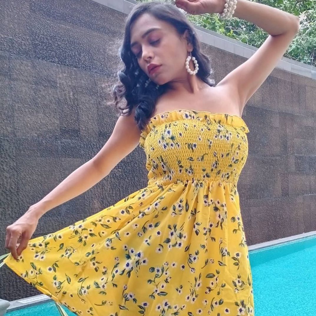 Nehal Vadoliya in yellow dress