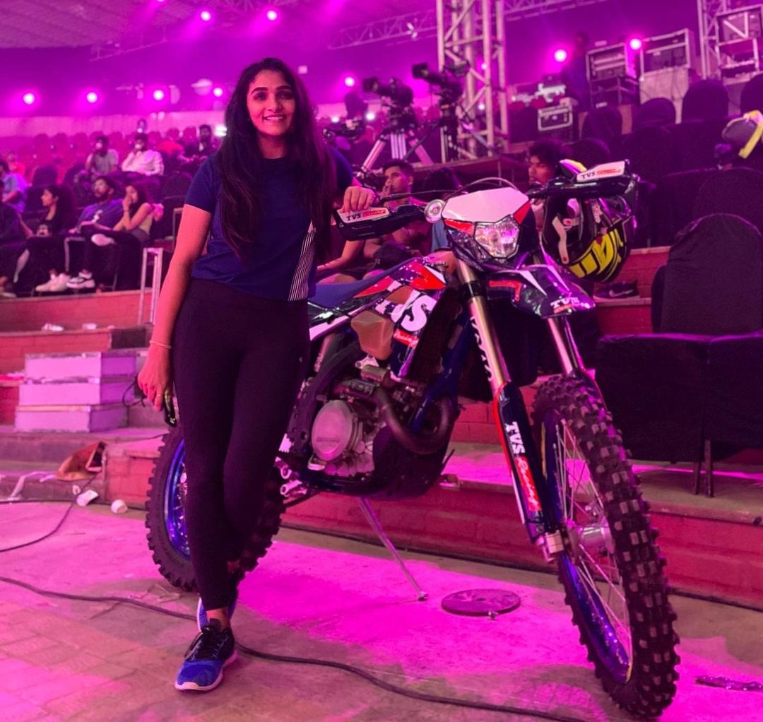 Divya Uruduga with a sports bike