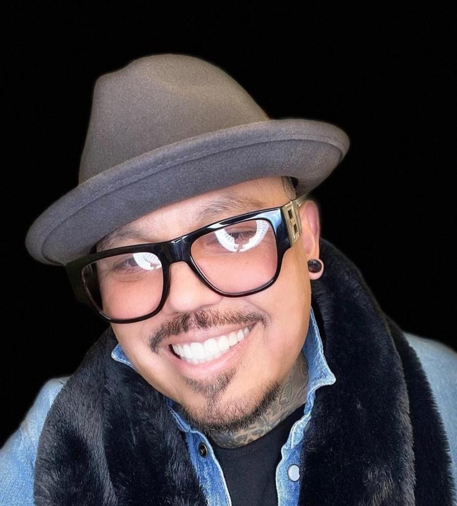 A.B Quintanilla smiling