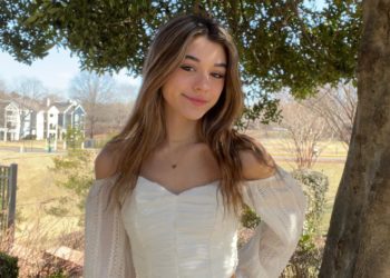 she in white crop top