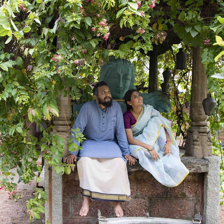 Radhe with her husband in a temple