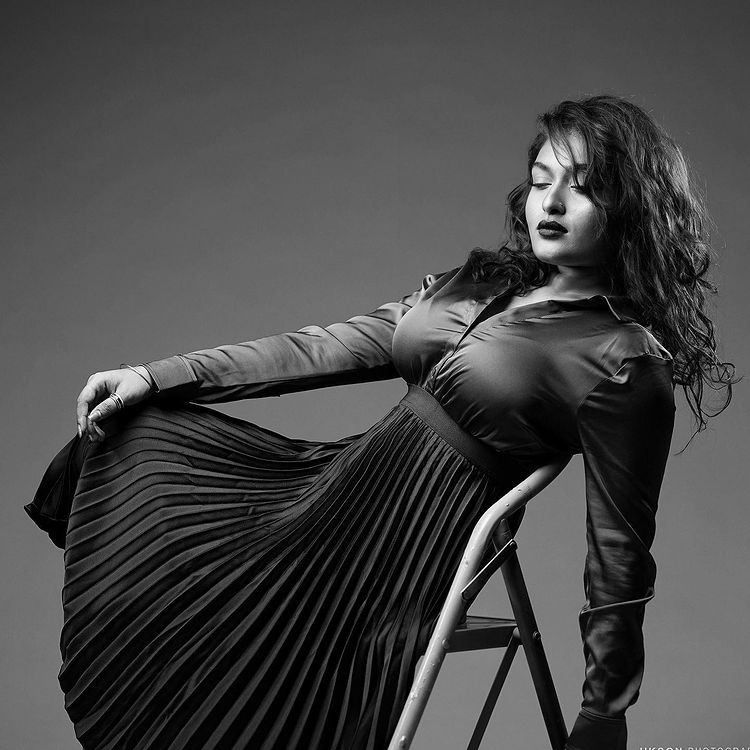 Prayaga black and white picture in a gown