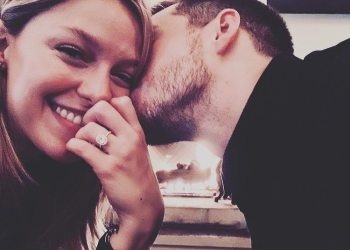 Chris wood kissing his wife