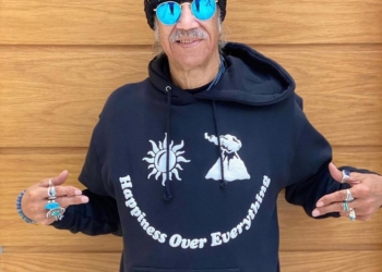 Dr. Karamo Chilombo wearing black hoodie