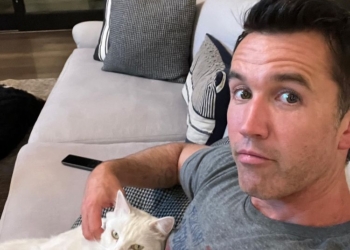 rob sitting with his cat