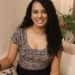Gautami sitting on sofa