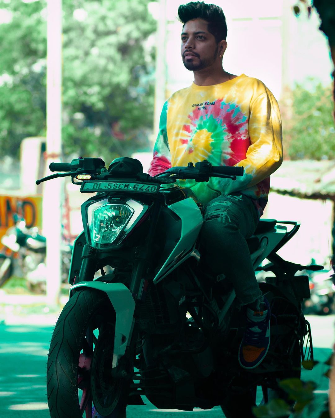 Romeo with his KTM bike. 