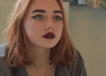 Kizzy Edgell with red lips