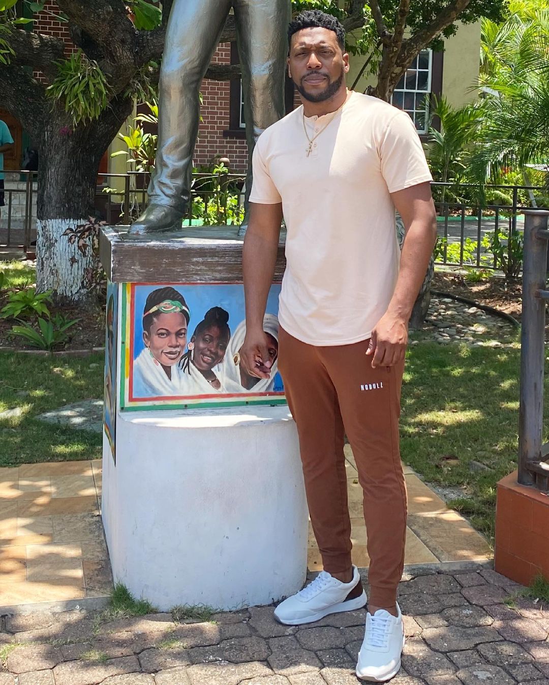 Jocko Sims posing in Jamaica. 