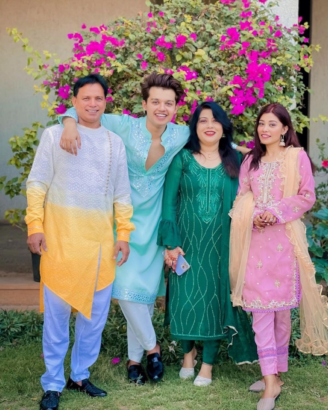 Riza posing with her family on Eid. 