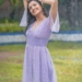 Malvika Sharma enjoying rain with a lavender dress