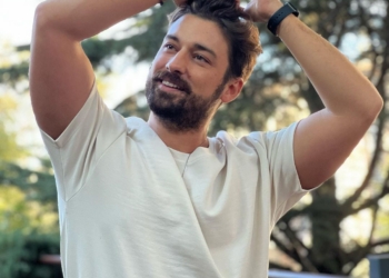 Alp Navruz in white t shirt