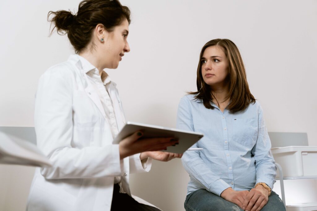 a woman talking to her doctor