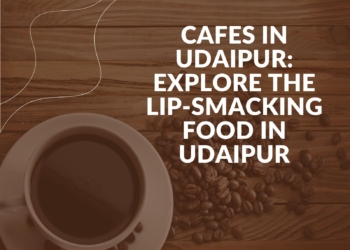 A cup of coffee with a text on the image "Cafes In Udaipur."
