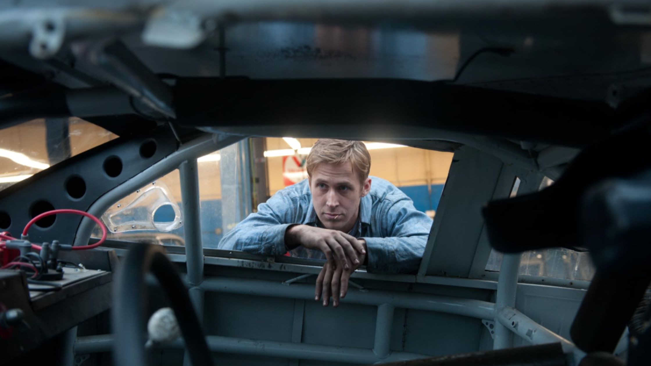 Ryan Reynolds looking from the car's window.