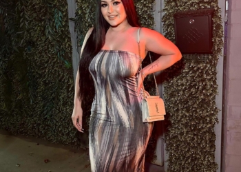 Candy Aguilar wearing a black colored outfit designed by Sebastianaiden.