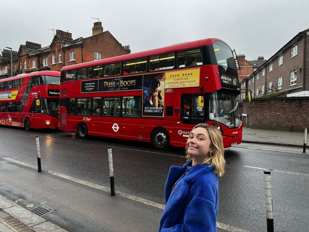 Florence Pugh taking selfie on one of the roads in London.
