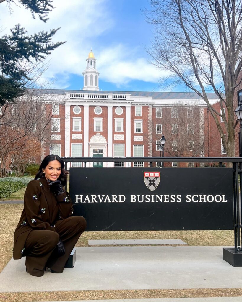 Diipa Khosla in front of Harvard Business School