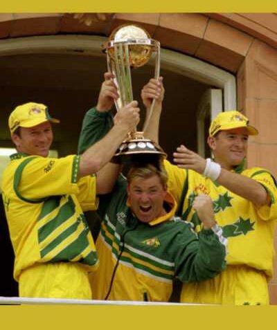 Mark Waugh lifting the trophy with his team